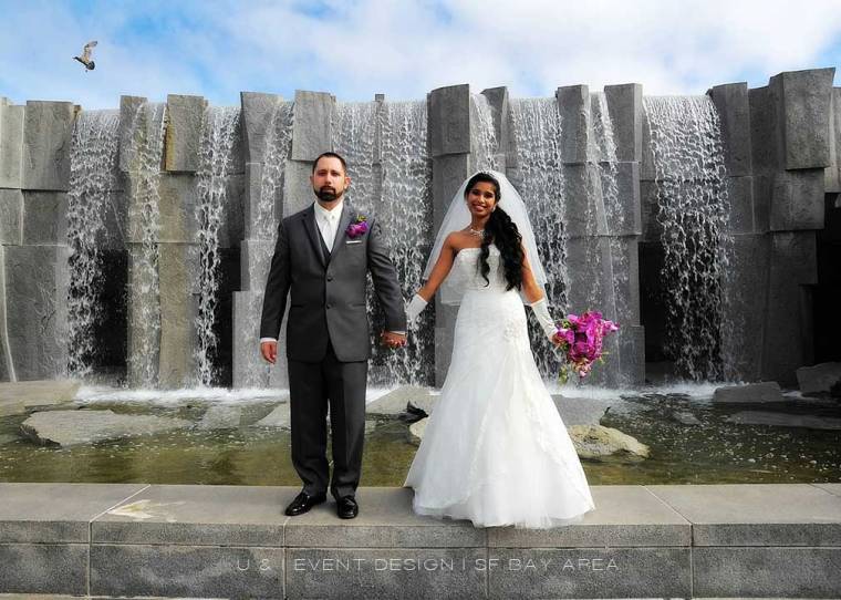 wedding photo idea of bride and groom standing in front of waterfall by bay area phootographer
